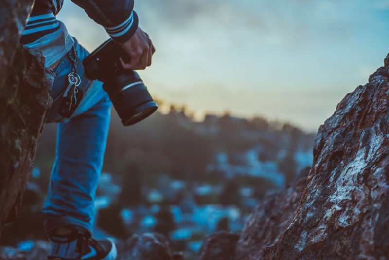 Fotografie Ausbildungen Fotograf mit Kamera